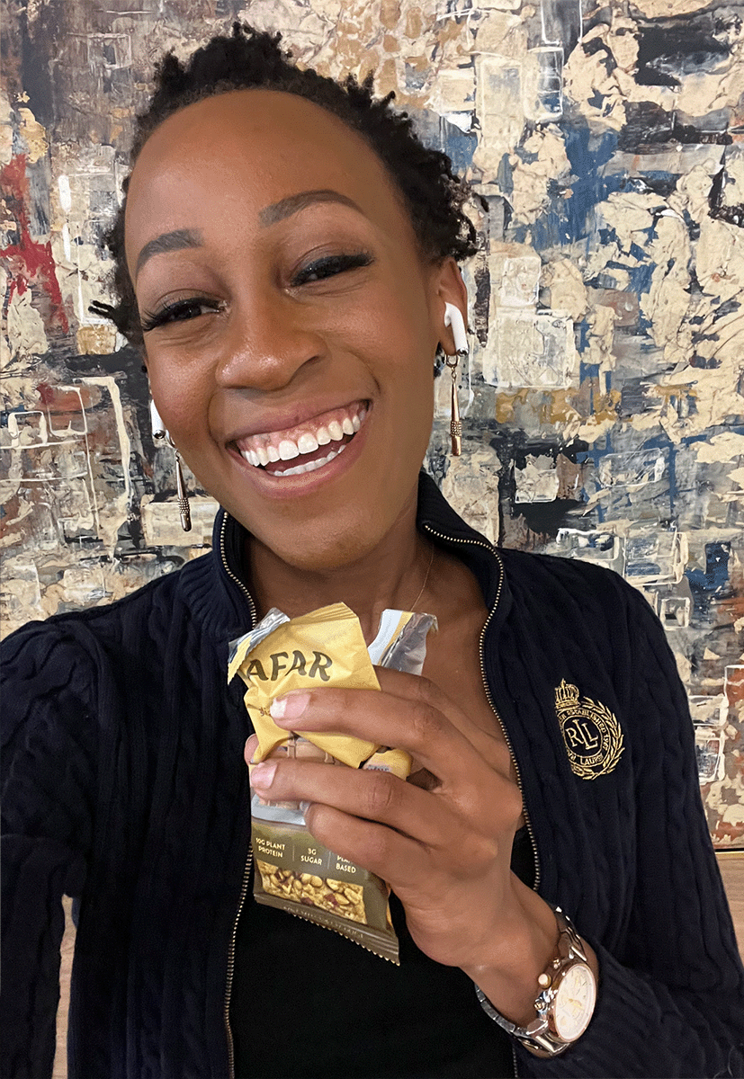 Woman eating Afar Indian Masala bar